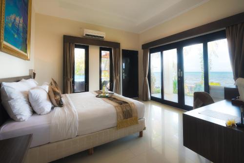 Imagen de la habitación del Hotel Padmasari Resort Lovina. Foto 5