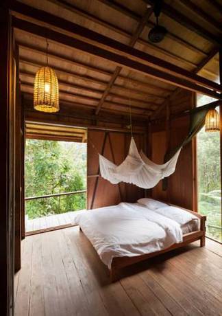 Imagen de la habitación del Hotel Paganakan Dii Tropical Retreat. Foto 2