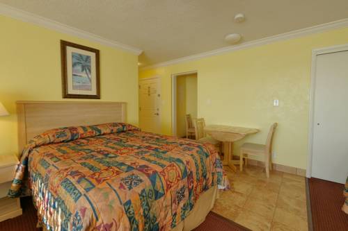 Imagen de la habitación del Hotel Page Terrace Beachfront. Foto 4