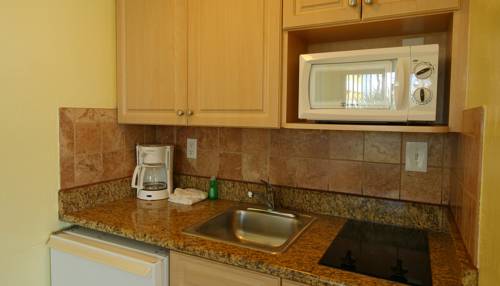 Imagen de la habitación del Hotel Page Terrace Beachfront. Foto 5
