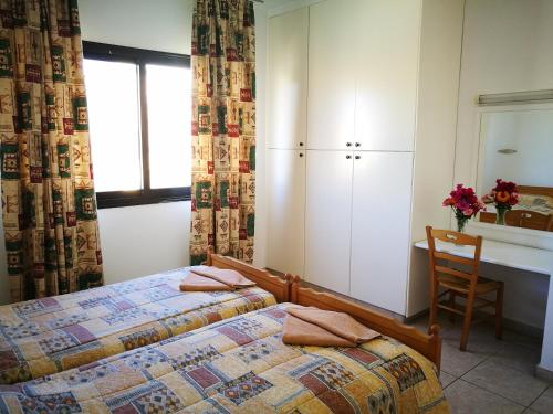 Imagen de la habitación del Hotel Pagona Holiday Apartments. Foto 7