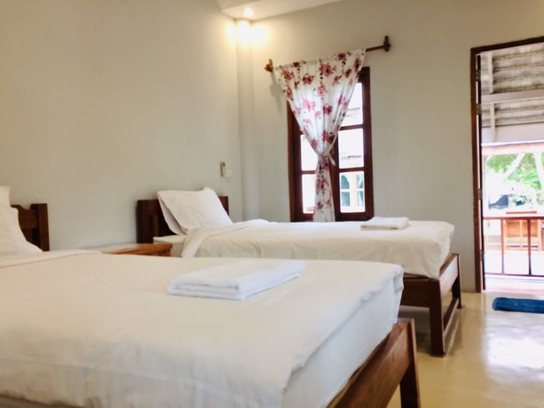 Imagen de la habitación del Hotel Pai Flora Resort. Foto 12