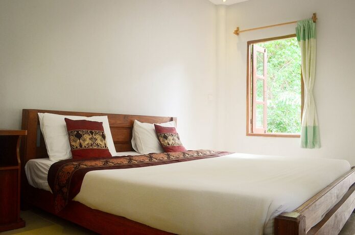 Imagen de la habitación del Hotel Pai Flora Resort. Foto 14