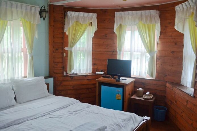 Imagen de la habitación del Hotel Pai Flora Resort. Foto 18