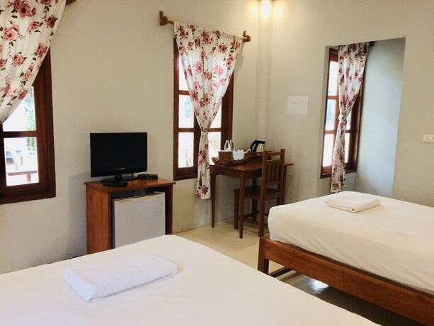 Imagen de la habitación del Hotel Pai Flora Resort. Foto 19