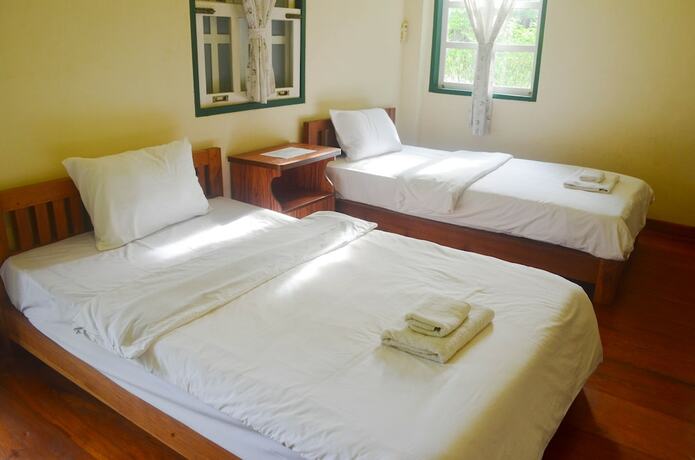Imagen de la habitación del Hotel Pai Flora Resort. Foto 22