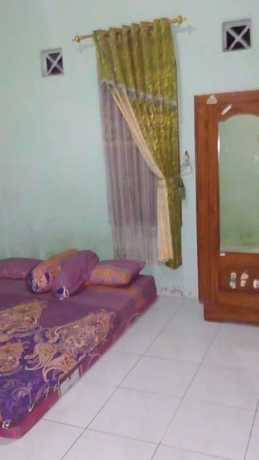 Imagen de la habitación del Hotel Pak Pur Homestay. Foto 5