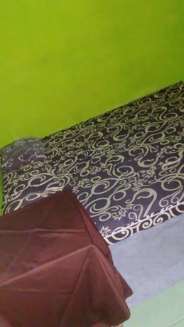 Imagen de la habitación del Hotel Pak Pur Homestay. Foto 6