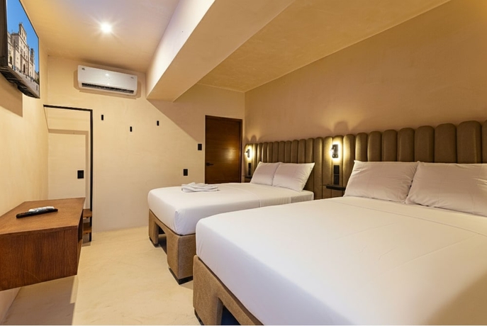 Imagen de la habitación del Hotel Pakal 58 Centro. Foto 6