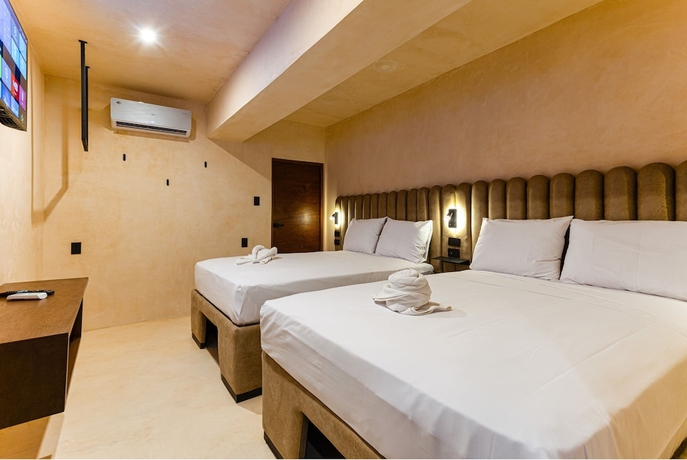 Imagen de la habitación del Hotel Pakal 58 Centro. Foto 7
