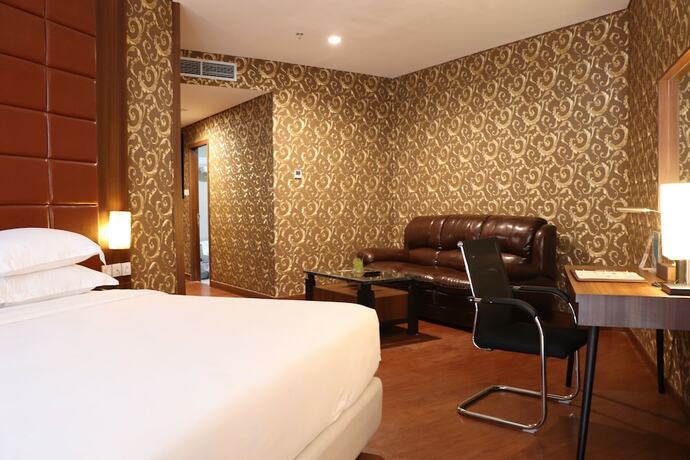 Imagen de la habitación del Hotel Pakons Prime. Foto 19