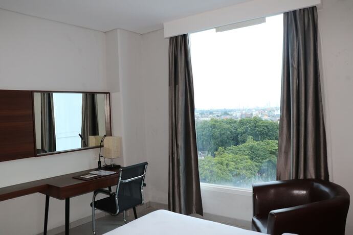 Imagen de la habitación del Hotel Pakons Prime. Foto 21