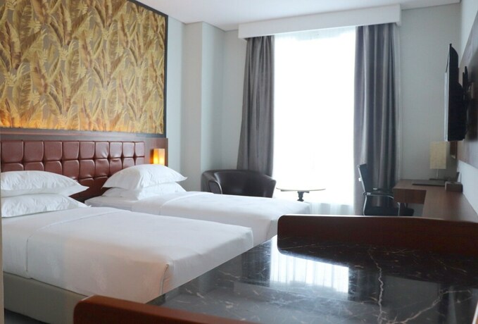 Imagen de la habitación del Hotel Pakons Prime. Foto 22