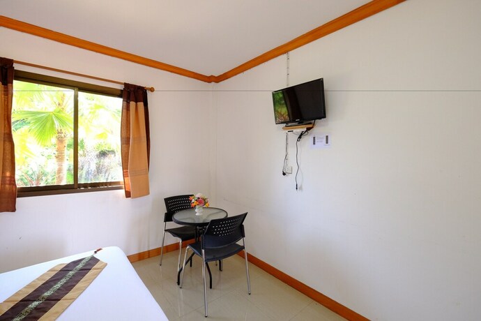 Imagen de la habitación del Hotel Paktraporn Resort. Foto 20