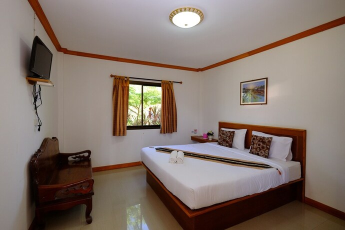 Imagen de la habitación del Hotel Paktraporn Resort. Foto 21