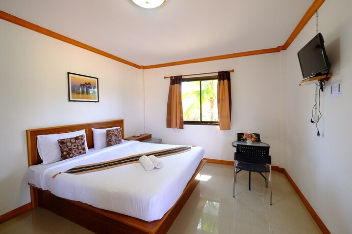 Imagen de la habitación del Hotel Paktraporn Resort. Foto 22