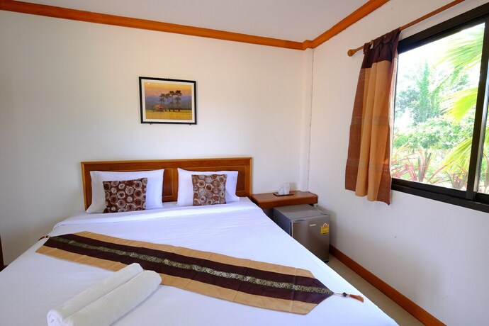 Imagen de la habitación del Hotel Paktraporn Resort. Foto 25