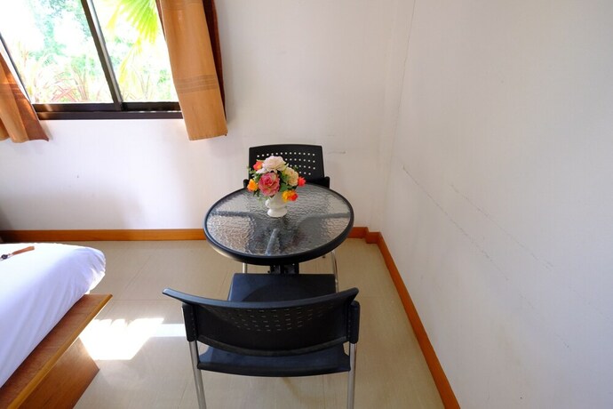 Imagen de la habitación del Hotel Paktraporn Resort. Foto 29