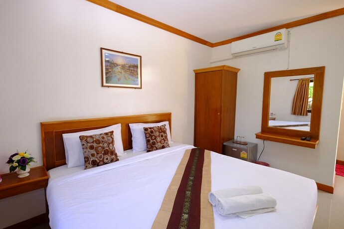 Imagen de la habitación del Hotel Paktraporn Resort. Foto 30