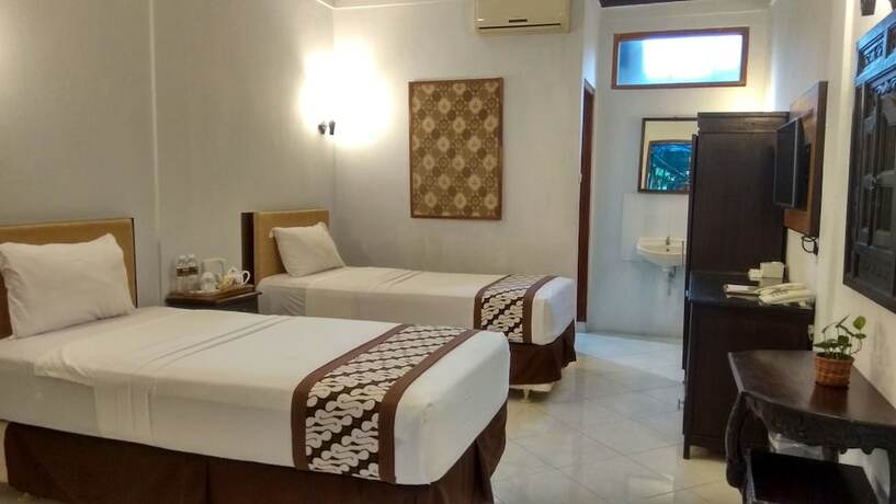 Imagen de la habitación del Hotel Paku Mas. Foto 9