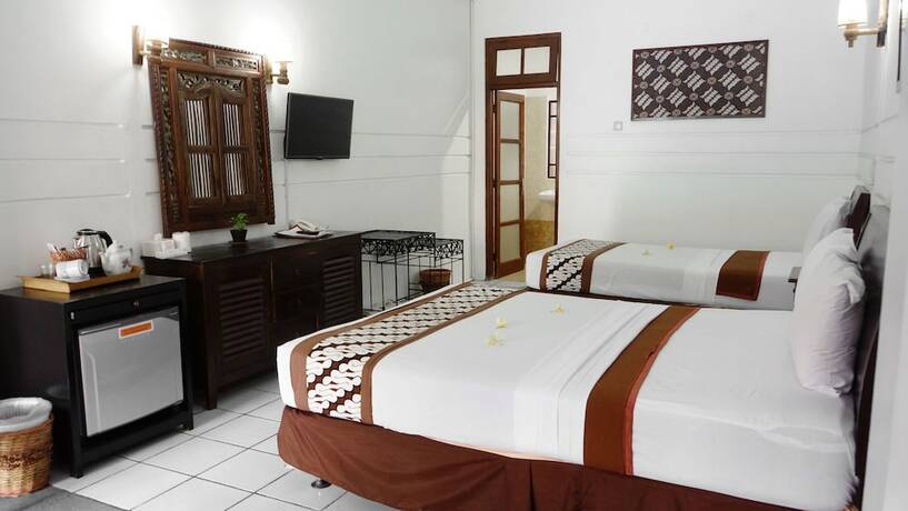 Imagen de la habitación del Hotel Paku Mas. Foto 12