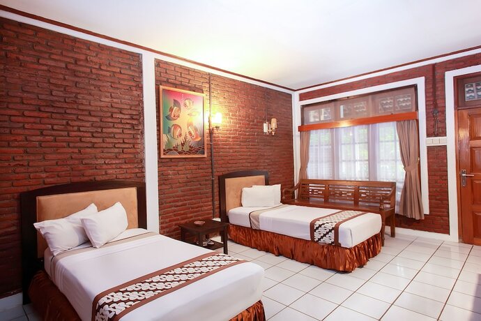 Imagen de la habitación del Hotel Paku Mas. Foto 13