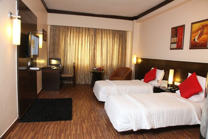 Imagen de la habitación del Hotel Pal Heights. Foto 16