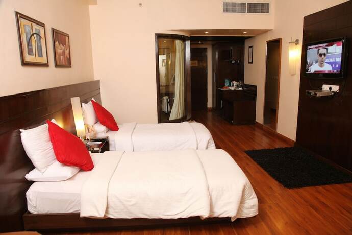 Imagen de la habitación del Hotel Pal Heights. Foto 18