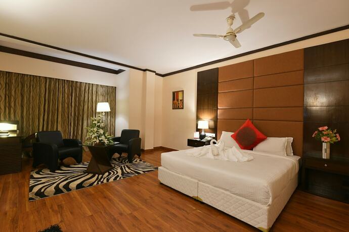 Imagen de la habitación del Hotel Pal Heights. Foto 19