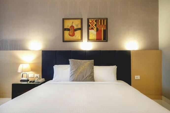 Imagen de la habitación del Hotel Pal Heights. Foto 20