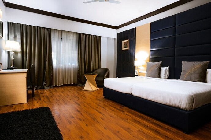 Imagen de la habitación del Hotel Pal Heights. Foto 21