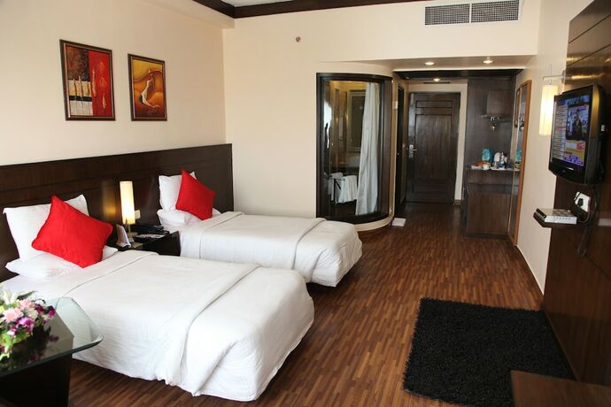 Imagen de la habitación del Hotel Pal Heights. Foto 22