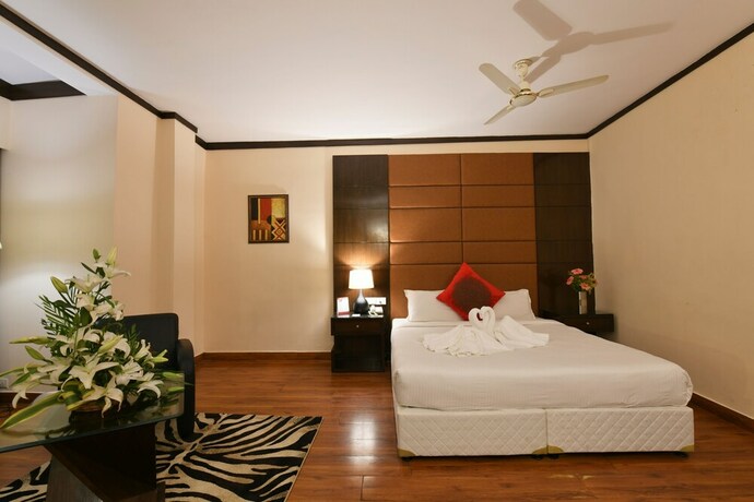 Imagen de la habitación del Hotel Pal Heights. Foto 24