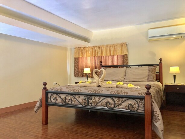 Imagen de la habitación del Hotel Pal-Watson Apartments. Foto 14
