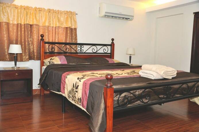 Imagen de la habitación del Hotel Pal-Watson Apartments. Foto 18
