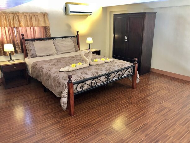 Imagen de la habitación del Hotel Pal-Watson Apartments. Foto 21