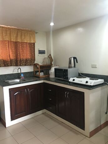 Imagen de la habitación del Hotel Pal-Watson Apartments. Foto 30