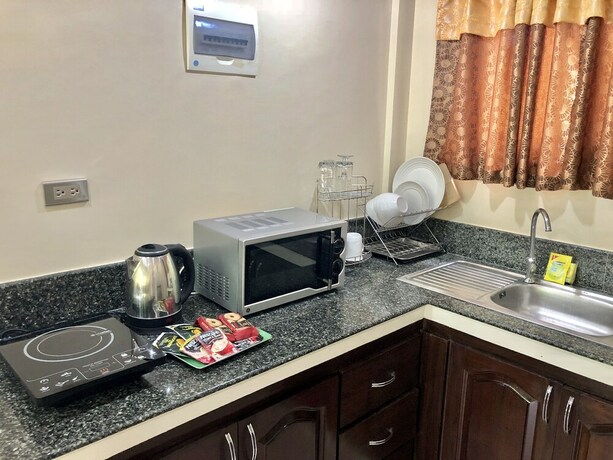 Imagen de la habitación del Hotel Pal-Watson Apartments. Foto 34