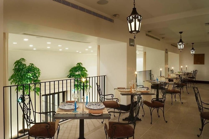 Imagen del bar/restaurante del Hotel Palace Catania UNA Esperienze. Foto 4