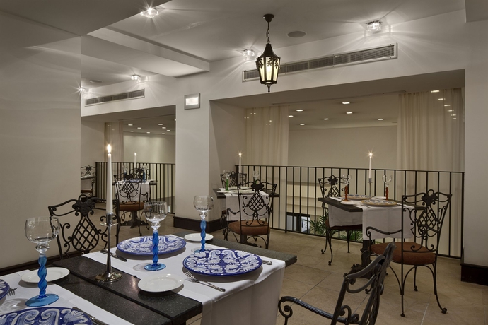 Imagen del bar/restaurante del Hotel Palace Catania UNA Esperienze. Foto 7