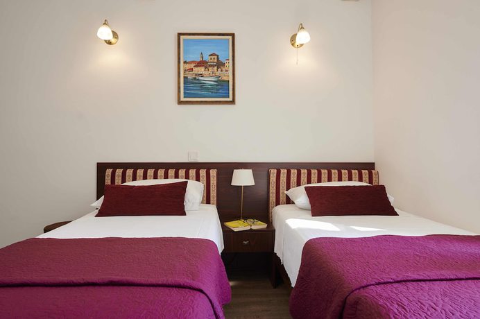 Imagen de la habitación del Hotel Palace Central Square. Foto 11