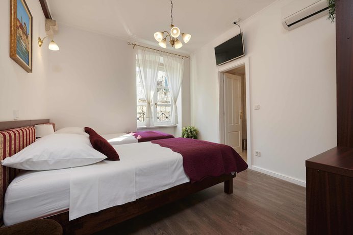 Imagen de la habitación del Hotel Palace Central Square. Foto 16