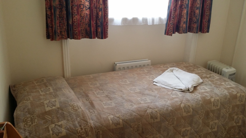 Imagen de la habitación del Hotel Palace Court. Foto 5