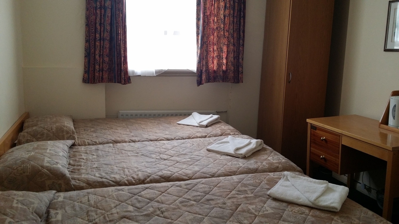 Imagen de la habitación del Hotel Palace Court. Foto 10