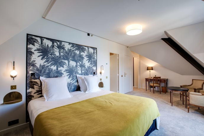 Imagen de la habitación del Hotel Palace De Menthon. Foto 4