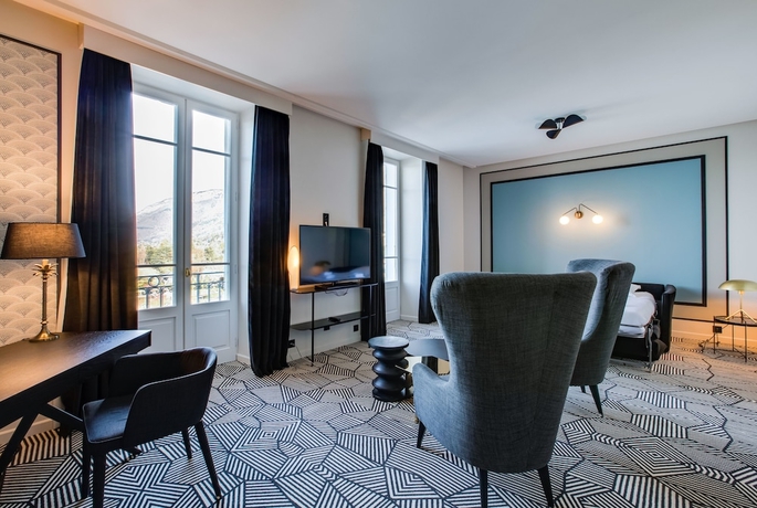 Imagen de la habitación del Hotel Palace De Menthon. Foto 5