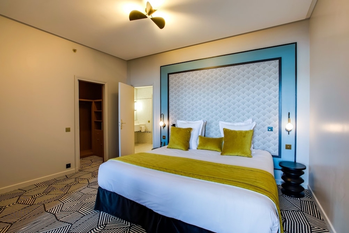 Imagen de la habitación del Hotel Palace De Menthon. Foto 11