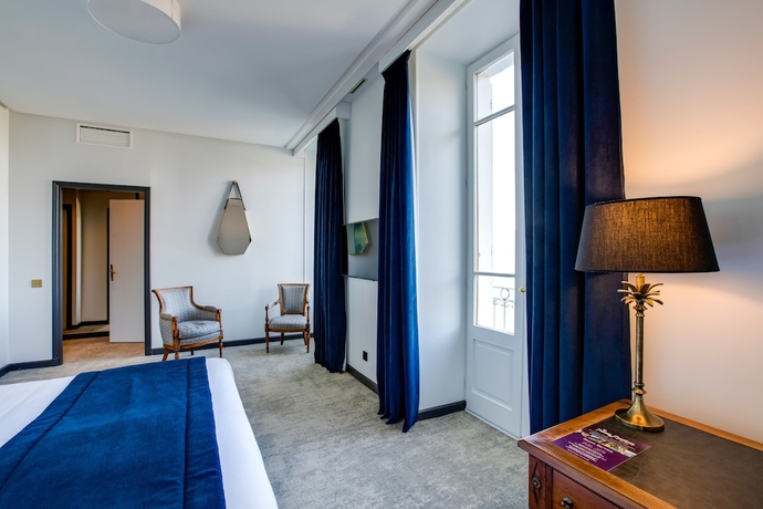 Imagen de la habitación del Hotel Palace De Menthon. Foto 13