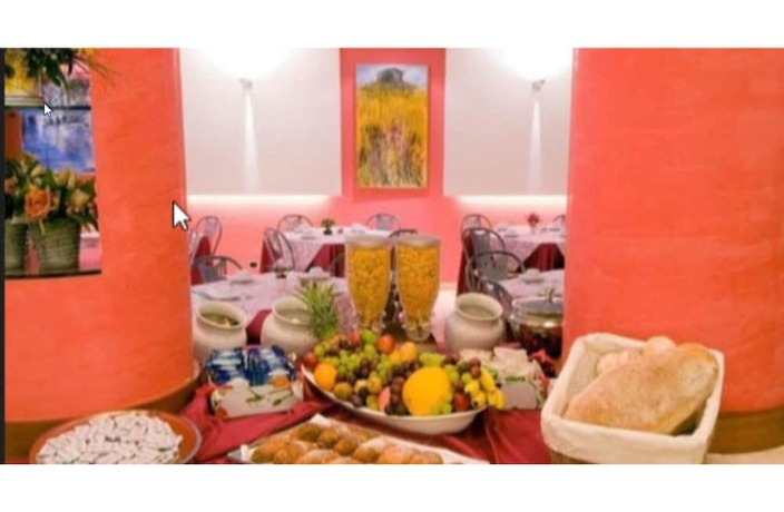 Imagen del bar/restaurante del Hotel Palace Due Ponti Hotel. Foto 5