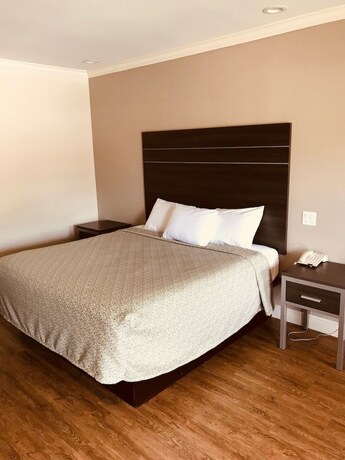 Imagen de la habitación del Hotel Palace Inn Greenspoint. Foto 14
